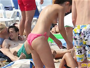 steaming ginormous boobies without bra inexperienced teens swimsuit Beach spycam