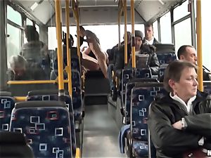 Lindsey Olsen plows her fellow on a public bus